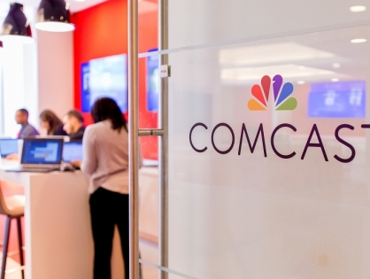 Comcast договорился о покупке доли Fox в Sky